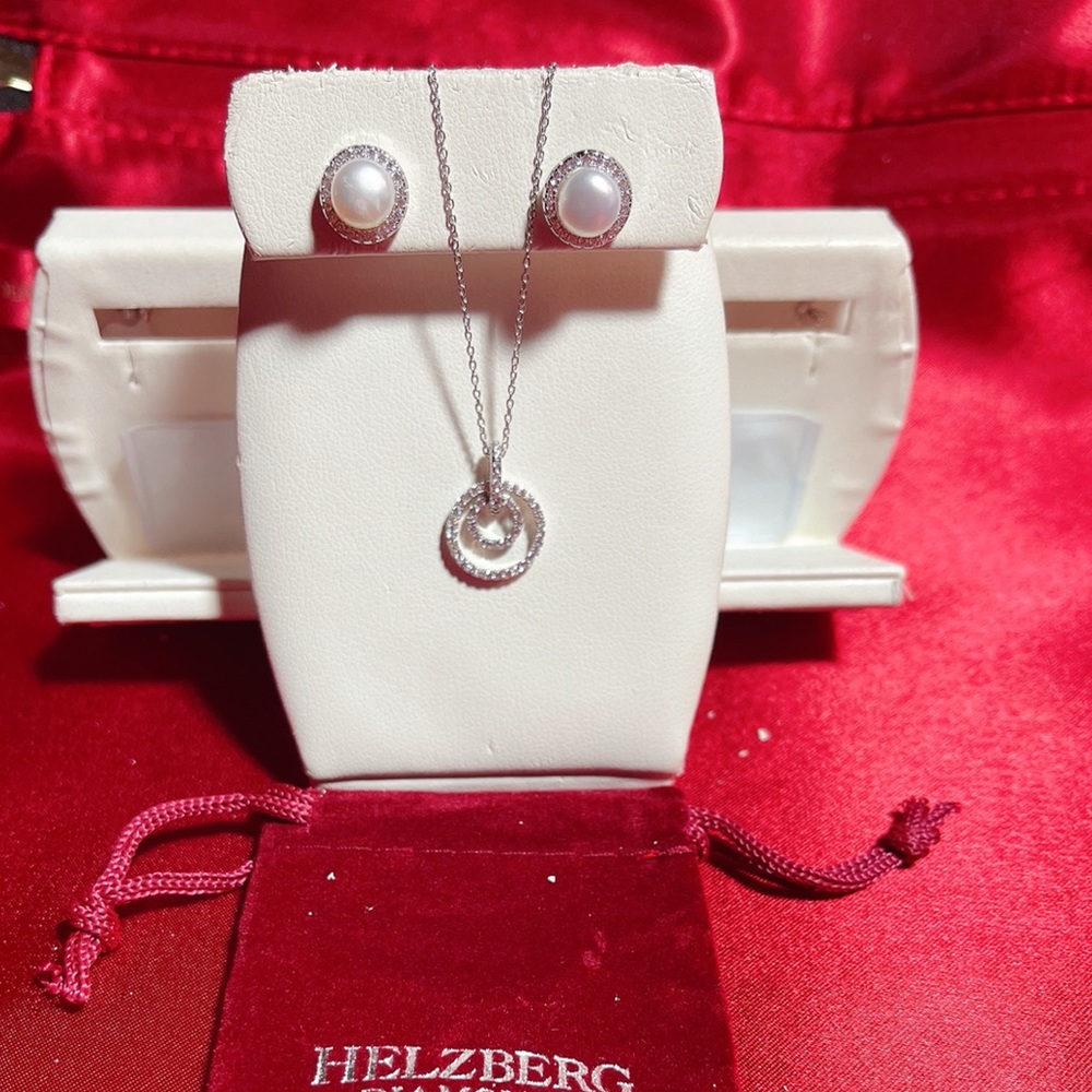 Brand new Silver earring and necklace